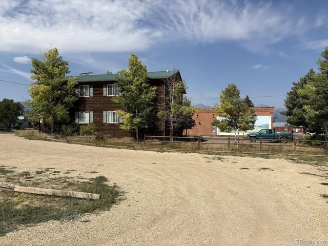 a front view of house with a yard