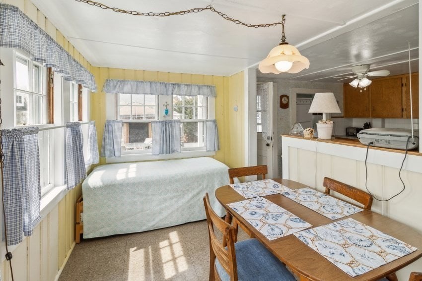 10 Surf Avenue Wareham, MA 02571 - Photo 11 of 14 a bedroom with a bed a table and chairs
