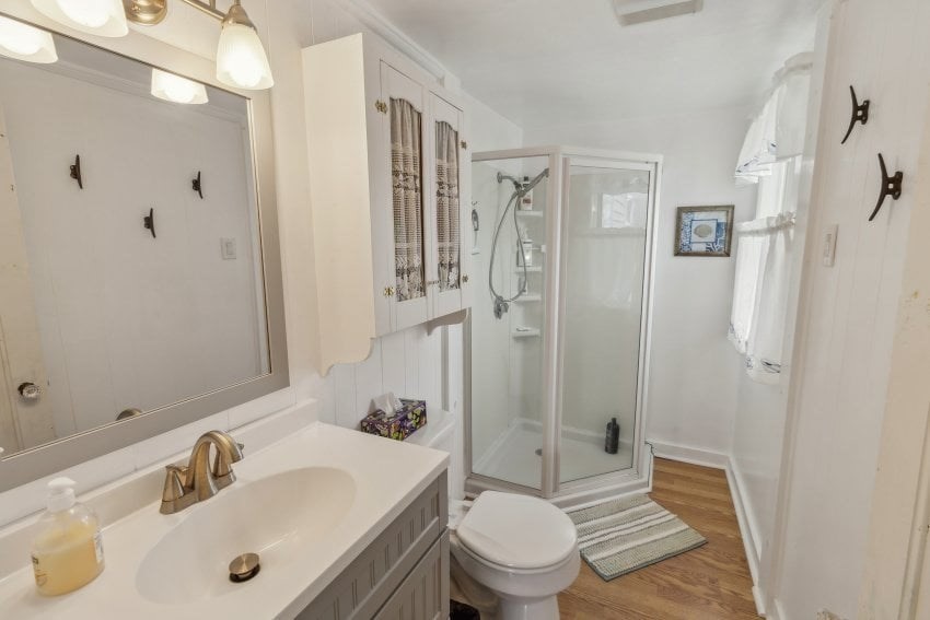 10 Surf Avenue Wareham, MA 02571 - Photo 7 of 14 a bathroom with a sink toilet and shower