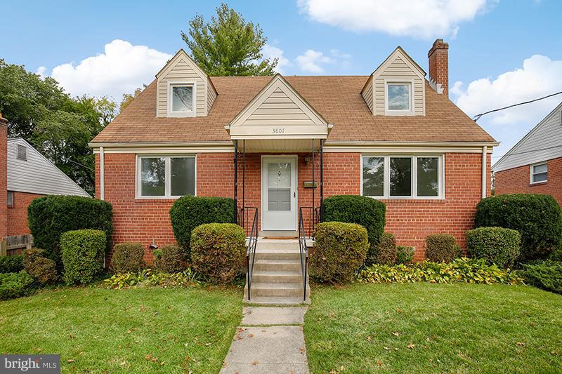 3807 Jeffry Street Silver Spring, MD 20906 - Photo 1 of 26 a front view of a house with garden
