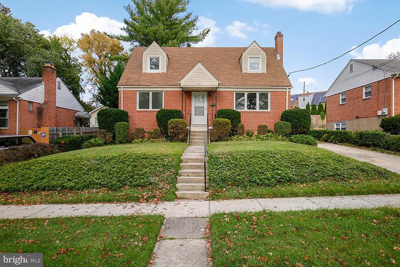 3807 Jeffry Street Silver Spring, MD 20906 - Photo 2 of 26 a front view of a house with a yard
