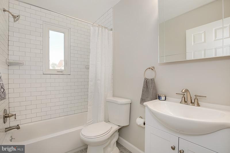 3807 Jeffry Street Silver Spring, MD 20906 - Photo 17 of 26 a bathroom with a sink toilet and shower