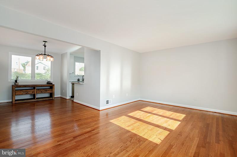 3807 Jeffry Street Silver Spring, MD 20906 - Photo 3 of 26 a view of empty room with wooden floor and window