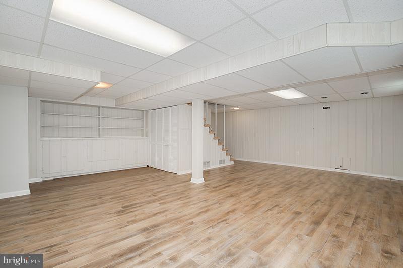 3807 Jeffry Street Silver Spring, MD 20906 - Photo 22 of 26 a view of an empty room with wooden floor