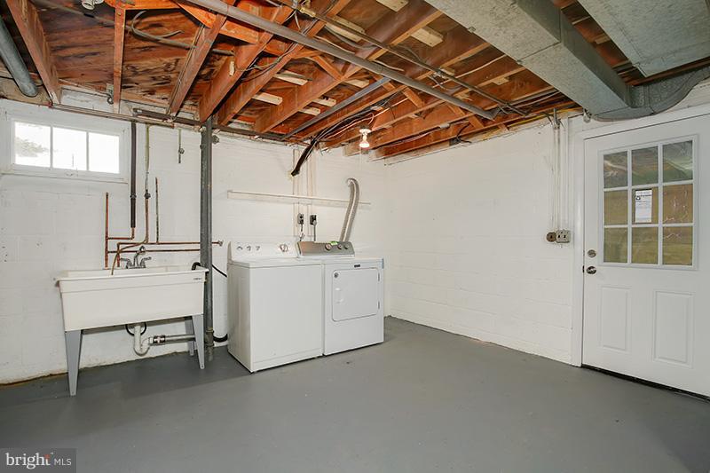 3807 Jeffry Street Silver Spring, MD 20906 - Photo 23 of 26 a utility room with dryer and washer