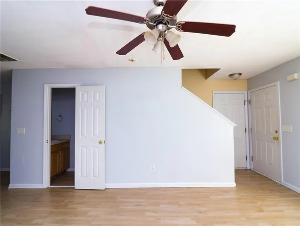 a view of a big room with wooden floor