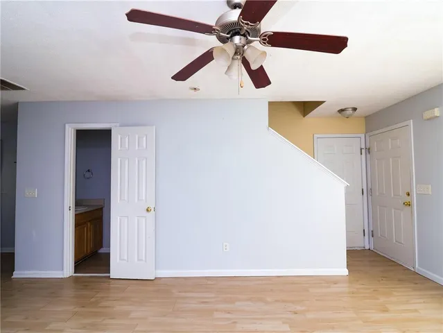 a view of a big room with wooden floor
