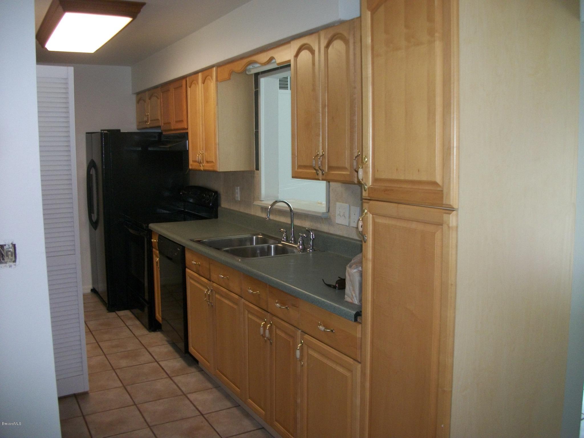 821 Hollahan Road Southeast Palm Bay, FL 32909 - Photo 2 of 11 Hollahankitchen1