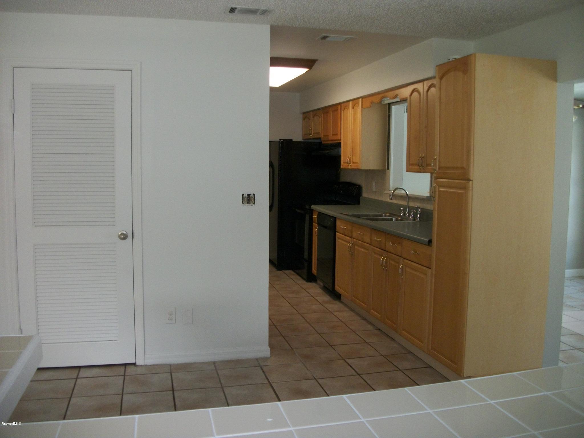 821 Hollahan Road Southeast Palm Bay, FL 32909 - Photo 3 of 11 Hollahankitchen2