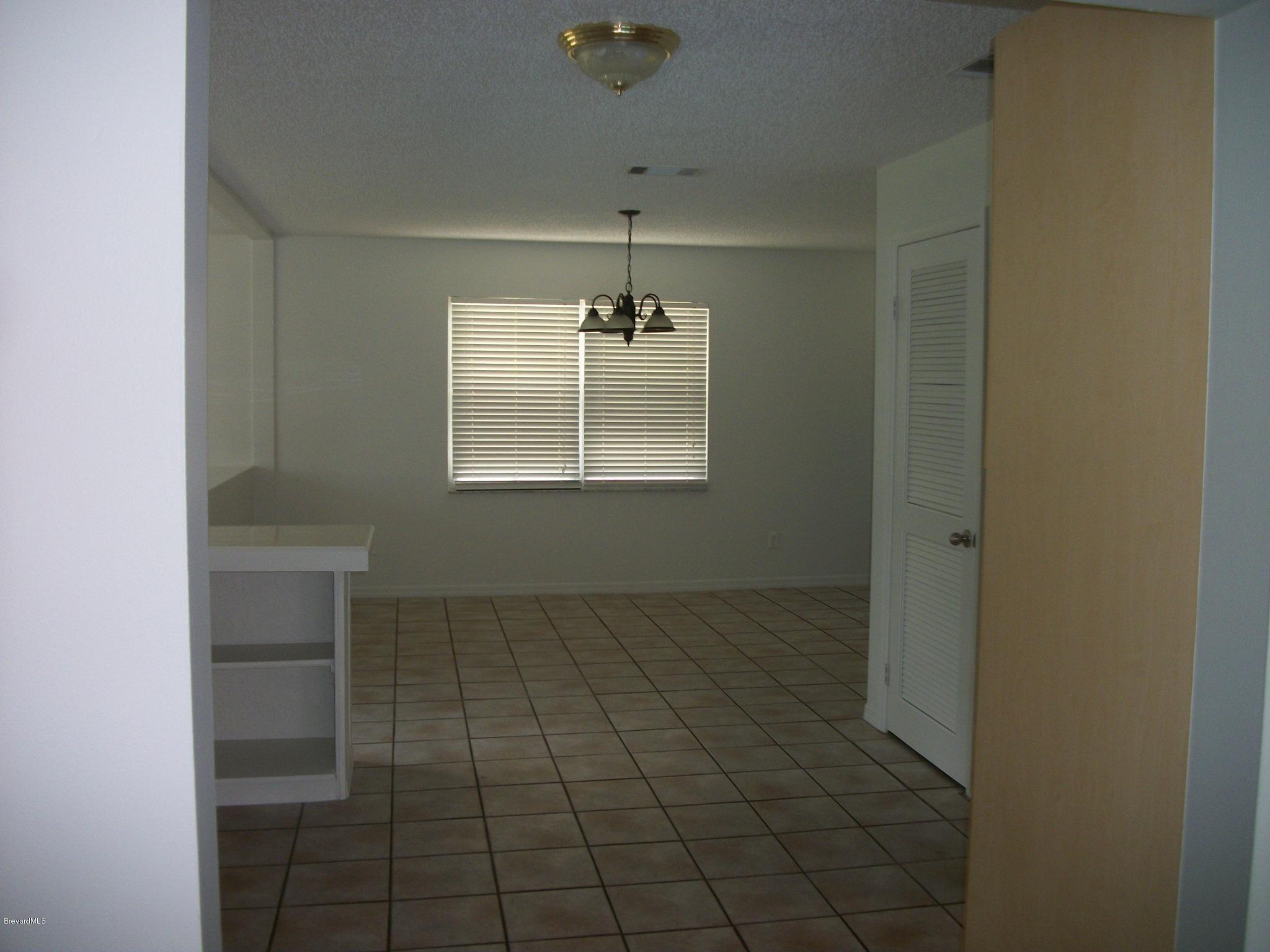 821 Hollahan Road Southeast Palm Bay, FL 32909 - Photo 5 of 11 Hollahanliving2