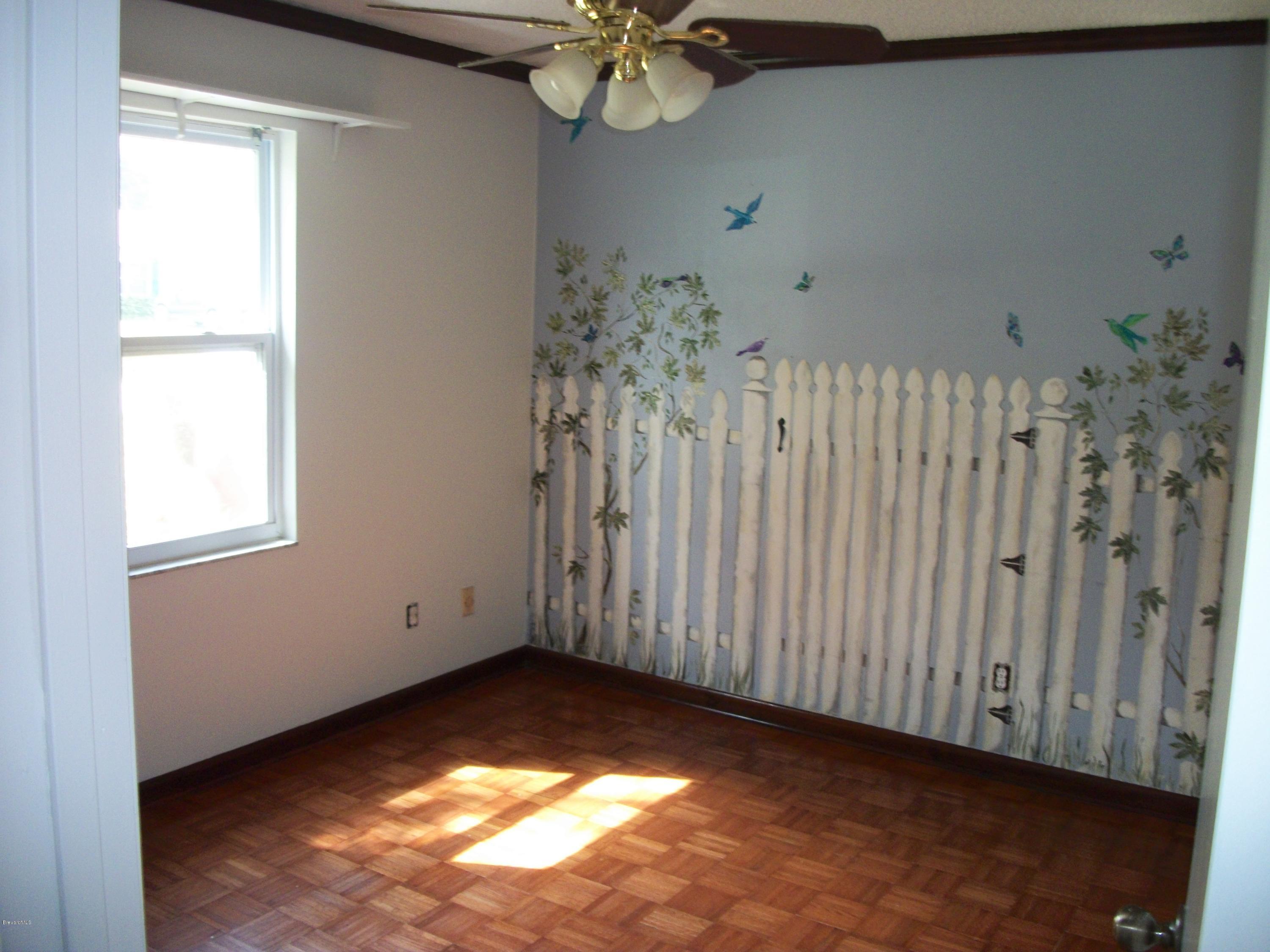 821 Hollahan Road Southeast Palm Bay, FL 32909 - Photo 7 of 11 HollahanBedroom2