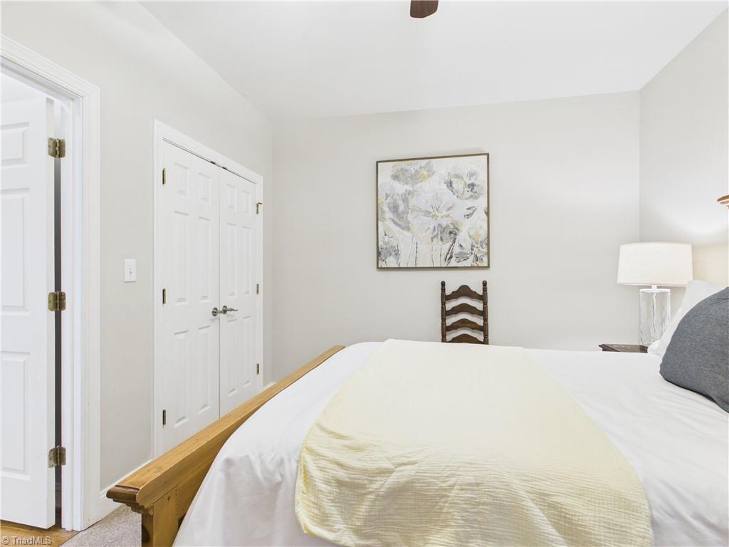 3105 Havasu Way High Point, NC 27265 - Photo 12 of 42 Nice bedroom on the main level that could be a primary or second suites that connects to a full bath.