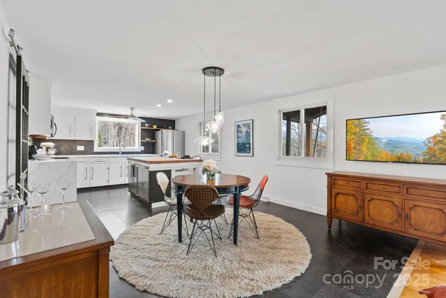 a view of a dining room with furniture