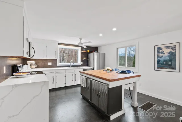 a kitchen with a stove and a sink