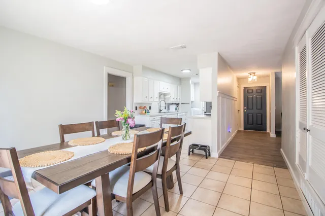 a view of a dining room with furniture