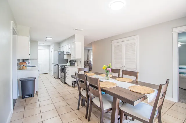 a view of a dining room with furniture