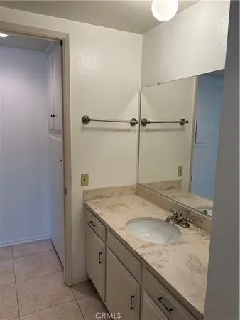 a bathroom with a tub and shower