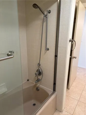 a view of a bathroom and window