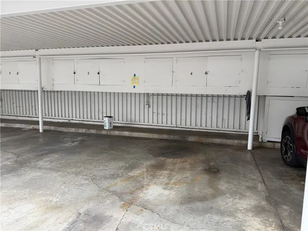 a view of a balcony with yard