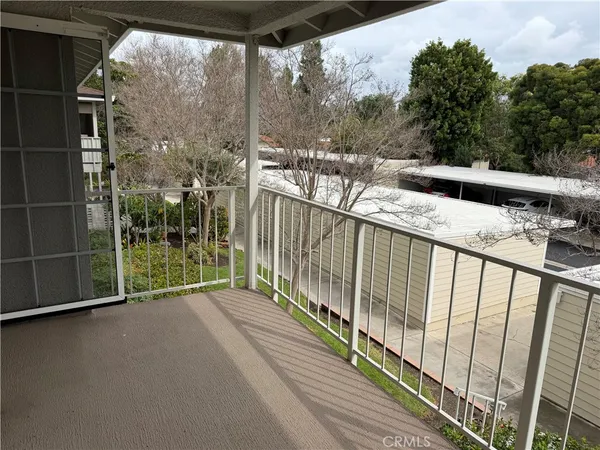 a house with trees in front of it