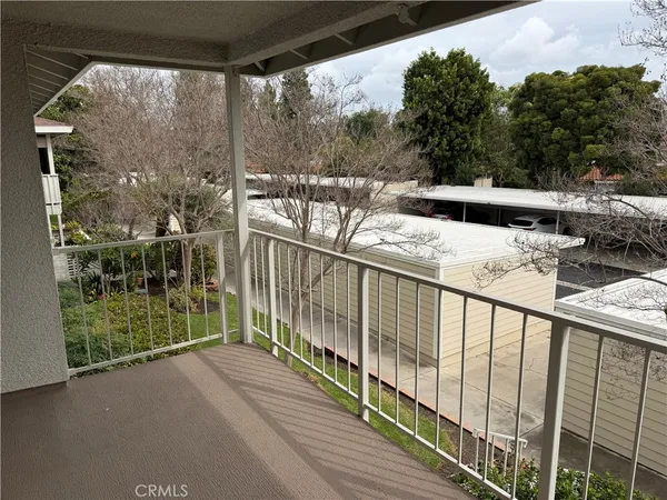 a view of balcony with couches