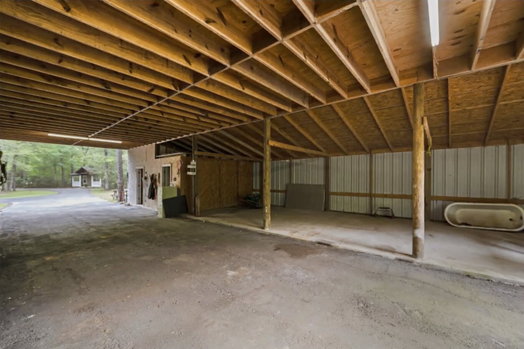 30338 Riley Road Waller, TX 77484 - Photo 43 of 46 a view of a car parking garage
