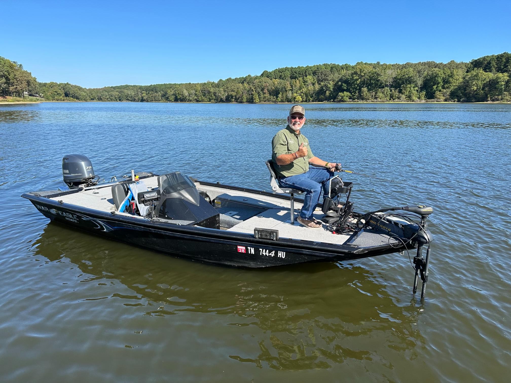 900 Olde Tennessee Trail Springville, TN 38256 - Photo 21 of 36 a view of a lake with a table and chairs in the patio