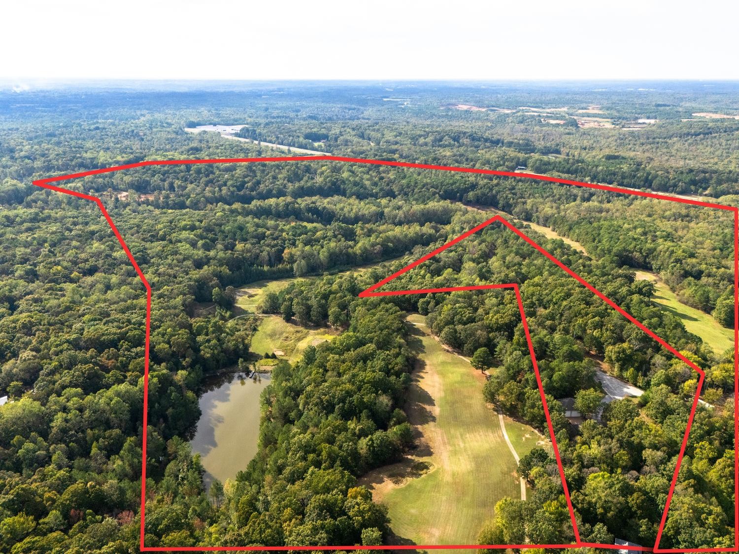 900 Olde Tennessee Trail Springville, TN 38256 - Photo 5 of 36 an aerial view of residential houses with outdoor space and trees
