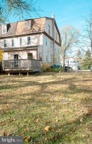 a view of a city street with a building