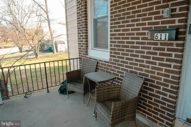 a view of a patio with a bench