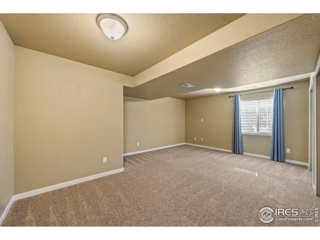 a view of a yard with a lake view