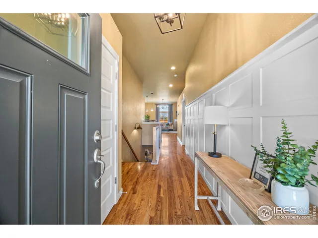 a view of a living room and a entryway