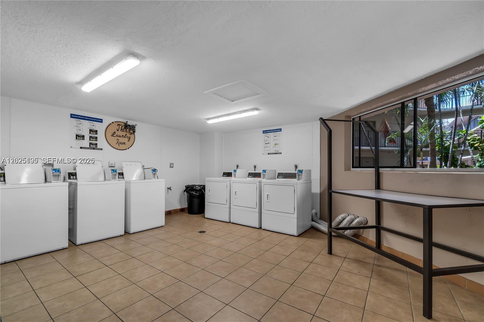 8400 Southwest 133rd Avenue Road, Unit 121 Miami, FL 33183 - Photo 18 of 43 a view of kitchen with furniture and window