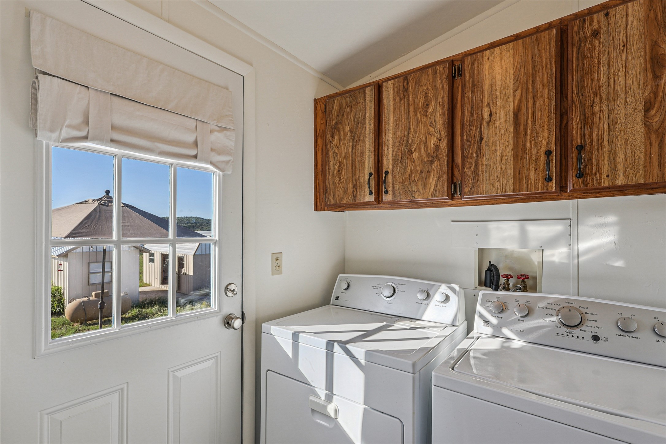 106 Ridge Line Drive Fort Davis, TX 79734 - Photo 25 of 39 a utility room with dryer and washer
