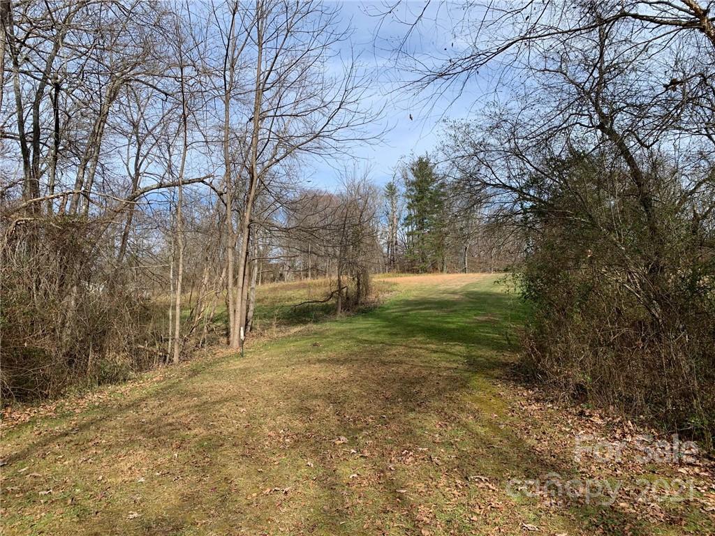 Tbd Tbd Fletcher Meadows Road Etowah, NC 28729 - Photo 4 of 10 a backyard of a house with lots of green space