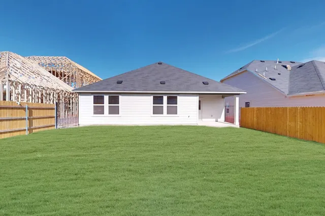 a house view with a garden space
