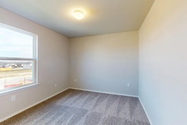 an empty room with a window