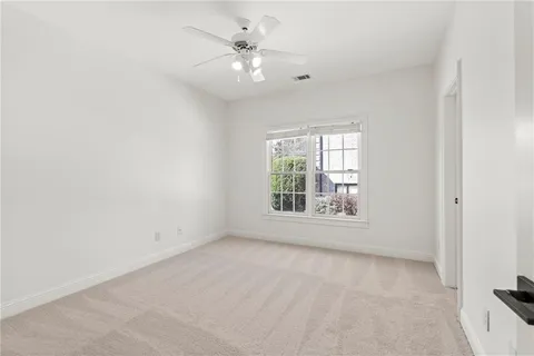 a bathroom with double vanity sink and a mirror