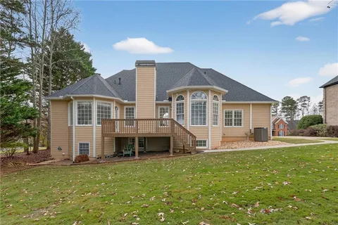 a view of a field with an trees