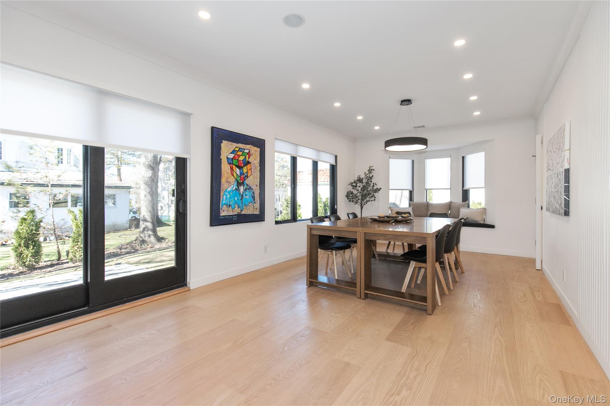 1 Bentley Road Great Neck, NY 11023 - Photo 13 of 34 a view of a dining room with furniture window and outside view