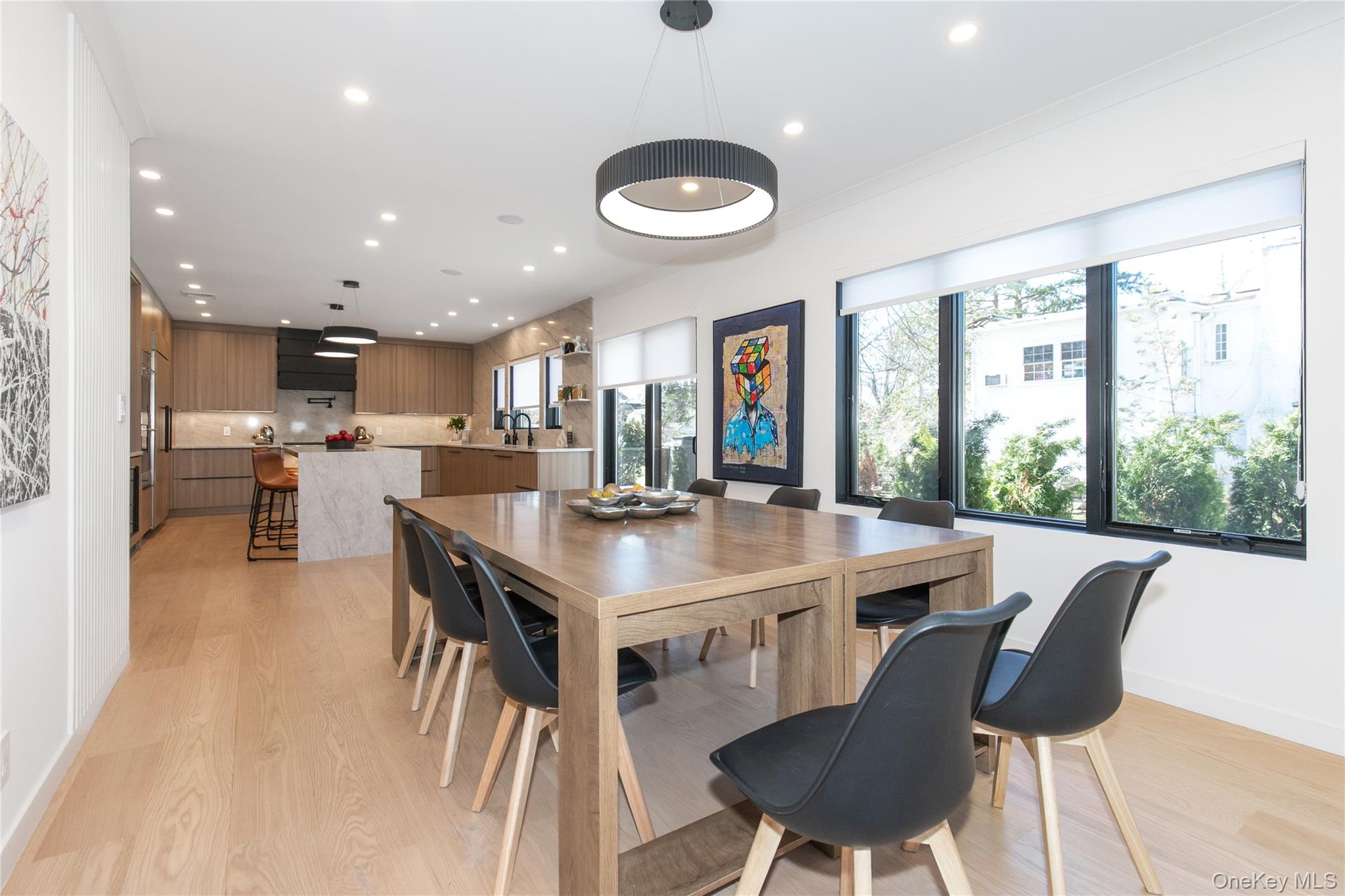 1 Bentley Road Great Neck, NY 11023 - Photo 14 of 34 a view of a dining room with furniture window and wooden floor