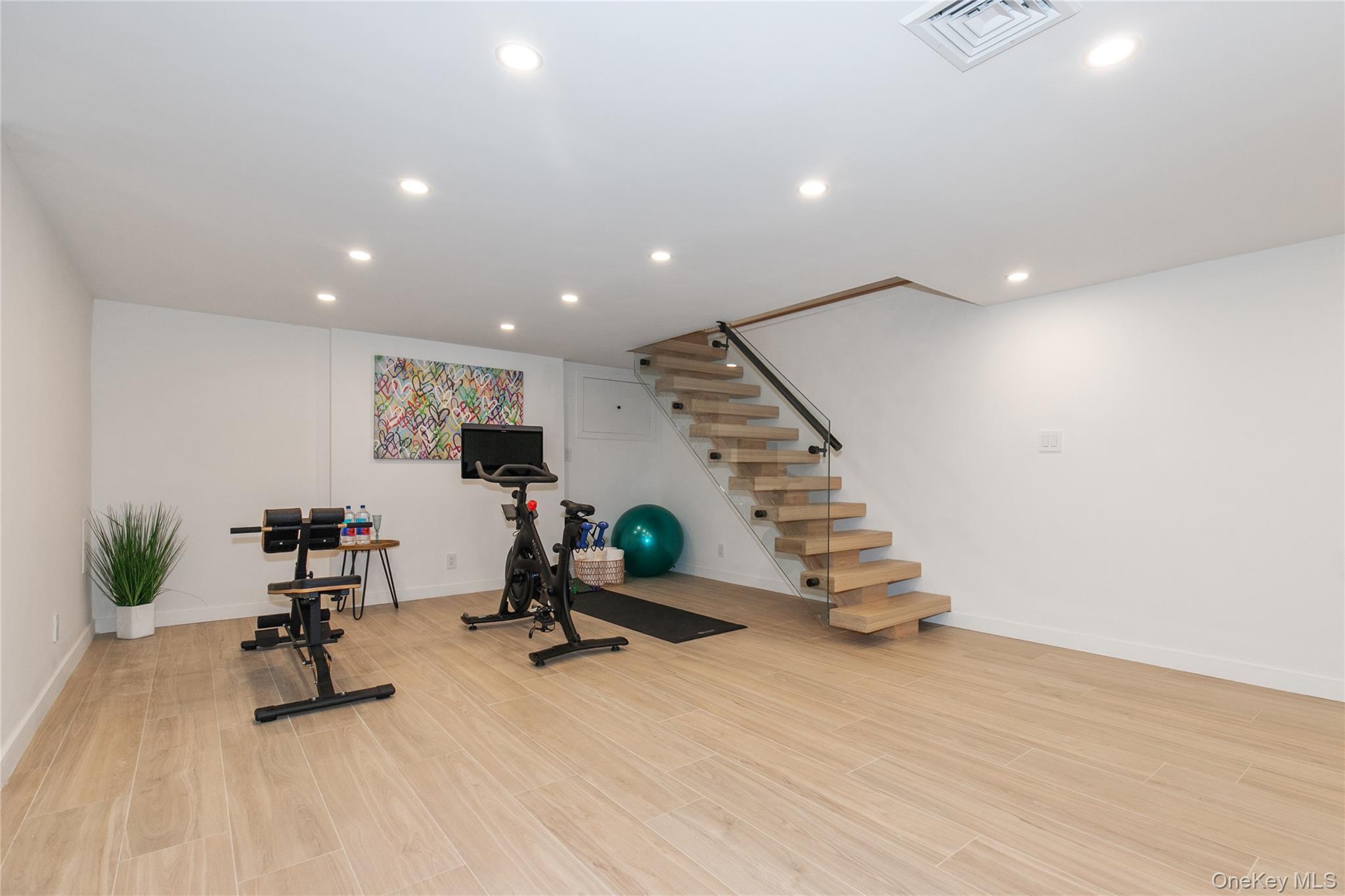 1 Bentley Road Great Neck, NY 11023 - Photo 27 of 34 a view of a room with gym equipment
