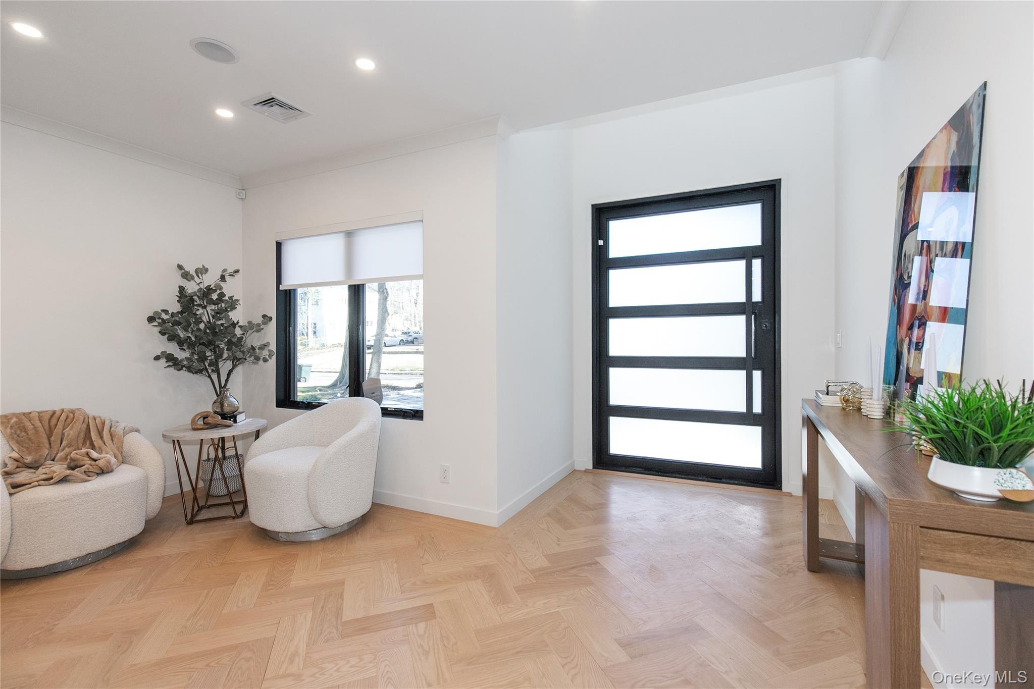 1 Bentley Road Great Neck, NY 11023 - Photo 3 of 34 a living room with furniture and potted plant