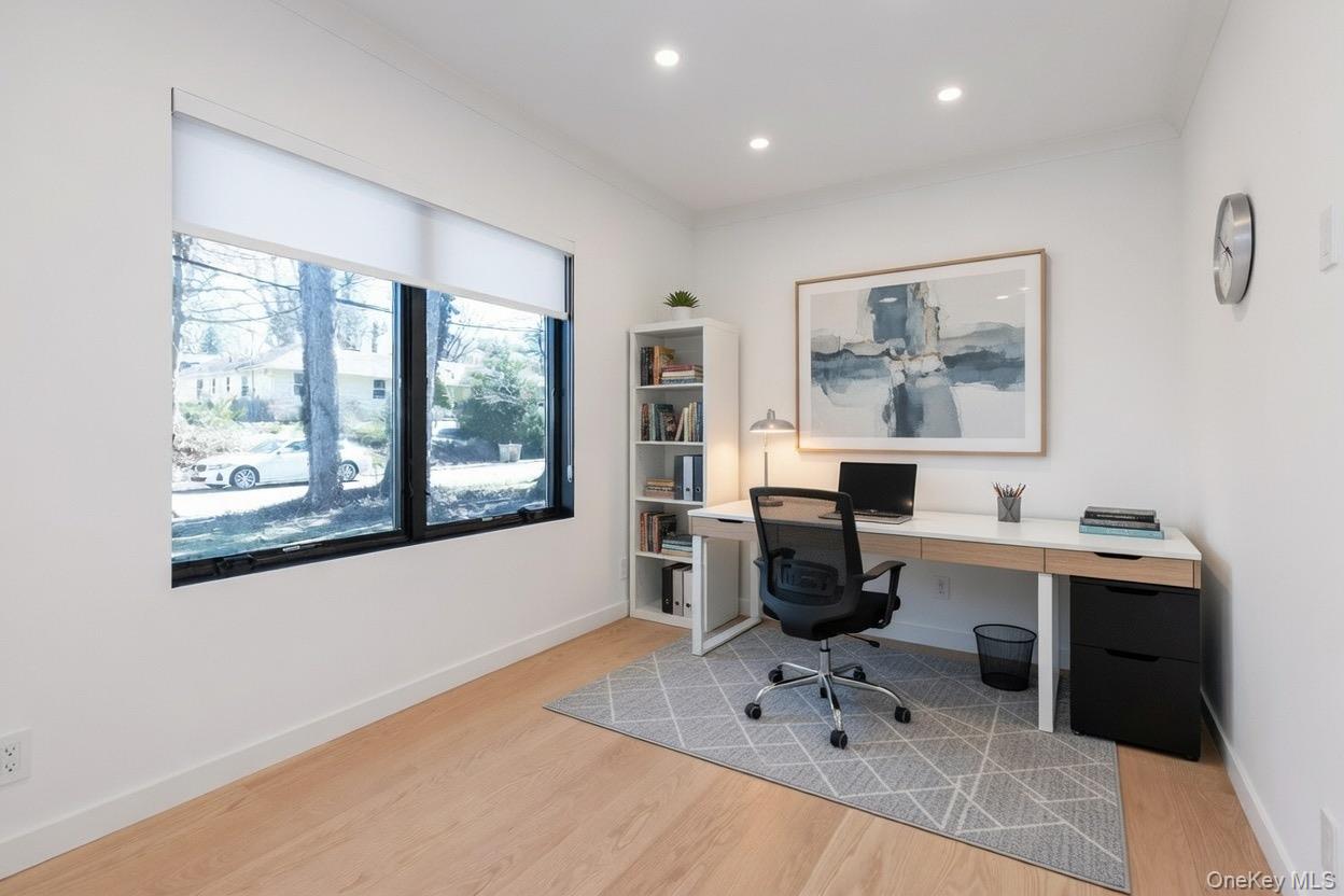 1 Bentley Road Great Neck, NY 11023 - Photo 7 of 34 a view of a workspace with furniture and a window