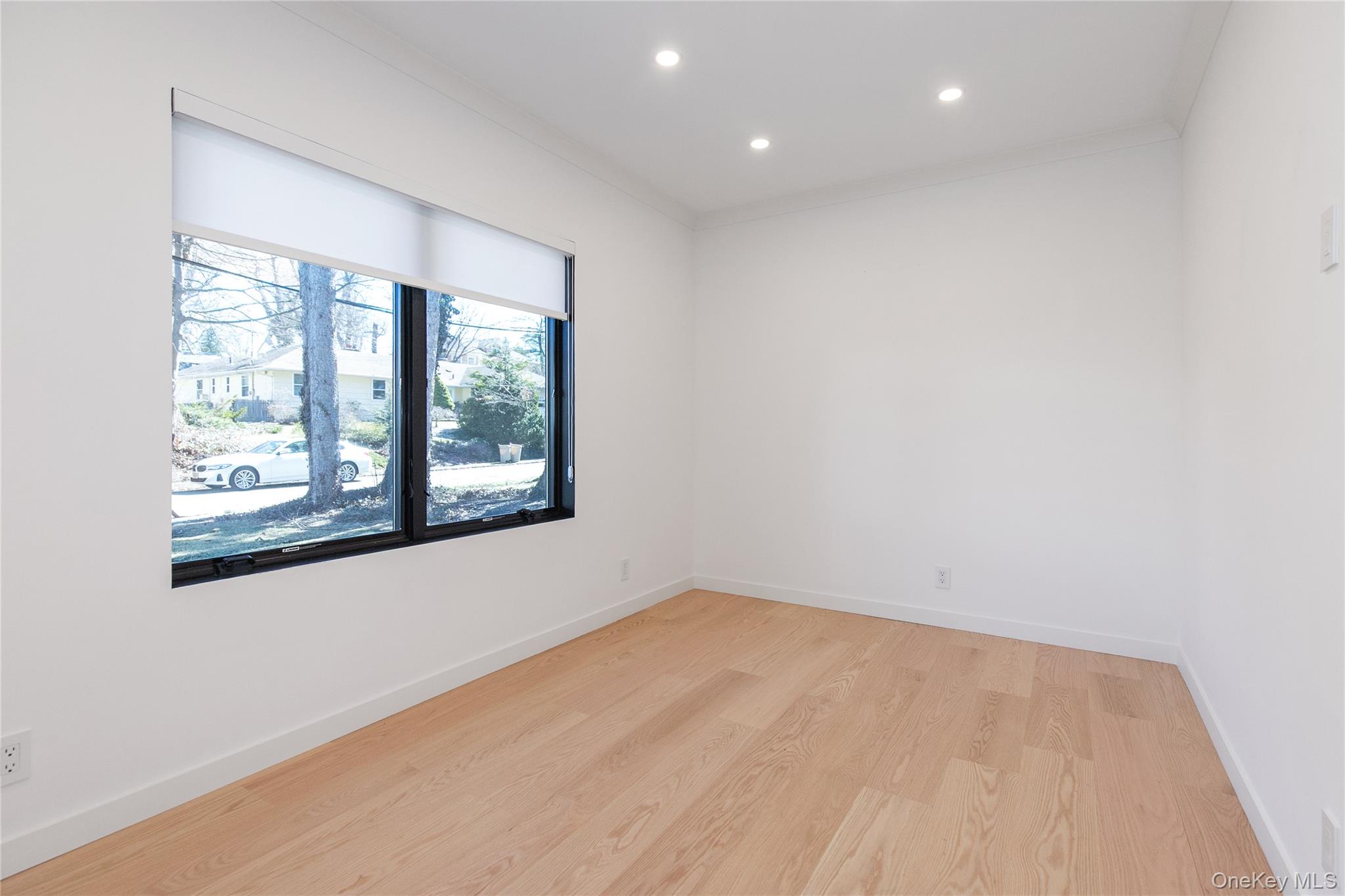 1 Bentley Road Great Neck, NY 11023 - Photo 8 of 34 an empty room with windows