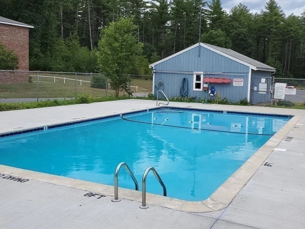 5 Turnpike Road, Unit 210 Townsend, MA 01469 - Photo 29 of 29 a front view of house with yard