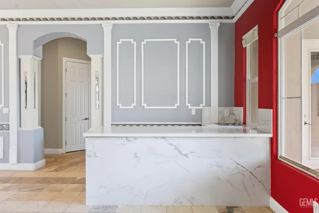 a view of an entryway with a kitchen