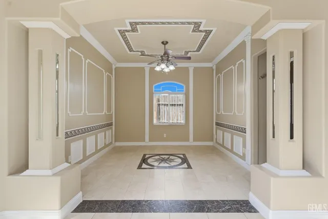 a view of a hallway with a chandelier