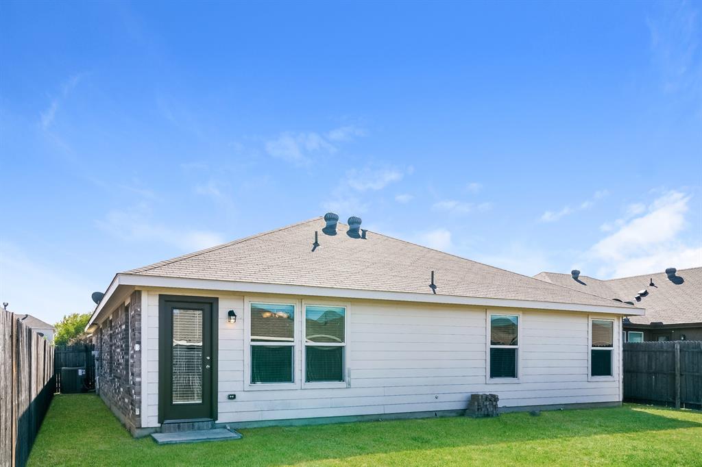 2016 Cattle Creek Road Fort Worth, TX 76134 - Photo 15 of 15 a front view of a house with a garden