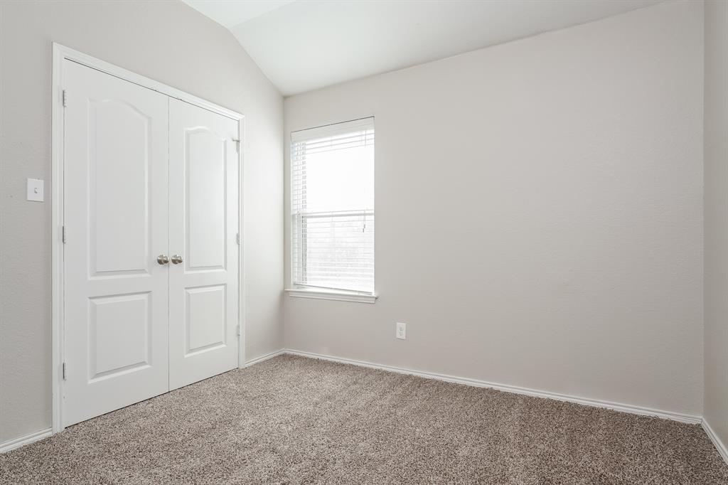 2016 Cattle Creek Road Fort Worth, TX 76134 - Photo 9 of 15 an empty room with windows